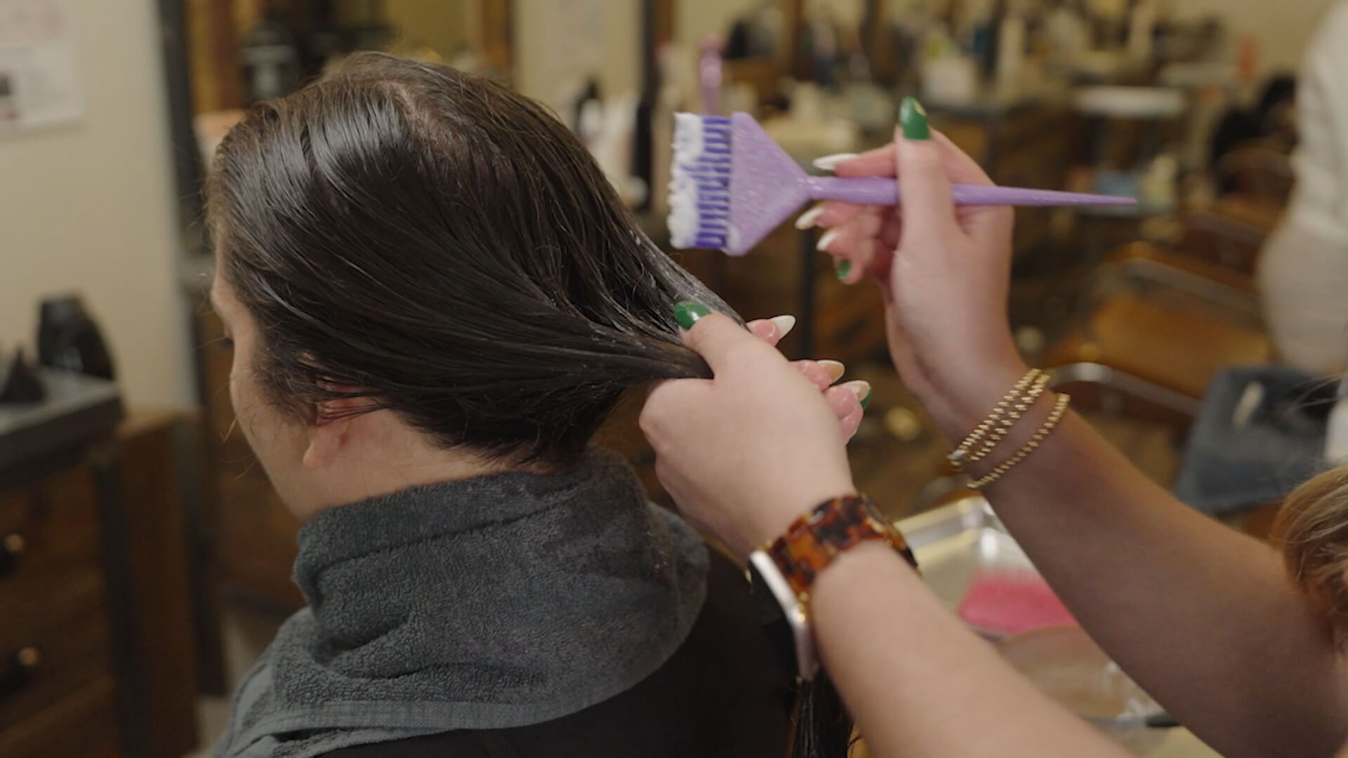 A photograph of hair being colored.